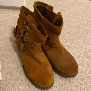 Caramel colored booties with cute buckle and lace details on side